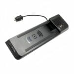 Black car wireless charging mounting dongle with USB port and cigarette-lighter plug; wireless charging icon on top surface