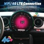 In-car infotainment screen showing a pink circular display and a 'WiFi/4G LTE Connection' banner above the dashboard indicating internet connectivity.
