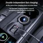 In-car wireless charging pad in the center console with a phone charging, advertising dual fast charging for Android and Apple devices.