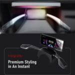 Car steering wheel with an integrated, clamp-on phone mount holding a smartphone displaying a dashboard app; advertisement text included.
